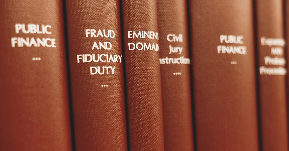 Legal books lined up at a law library