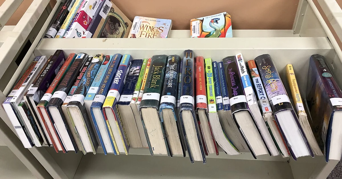 Books on a library cart